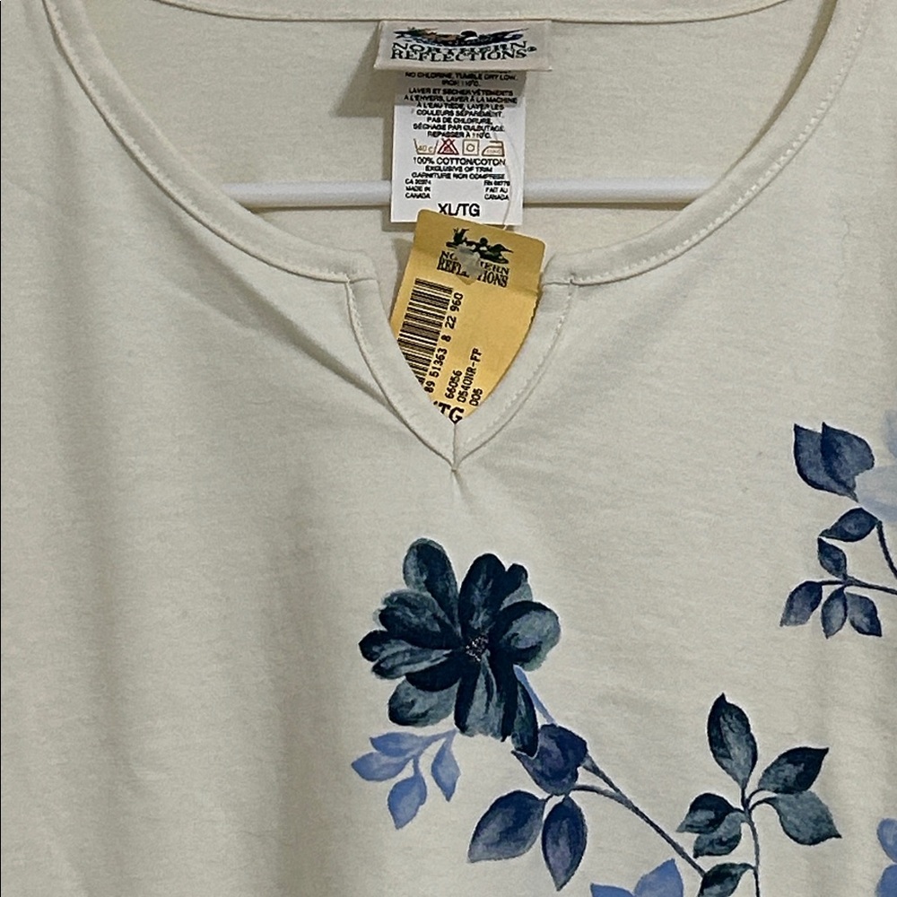 Northern Reflections Off White Tee with Blue Floral Design